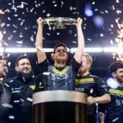 Team Vitality's Apex picking up the trophy of IEM Rio 2023