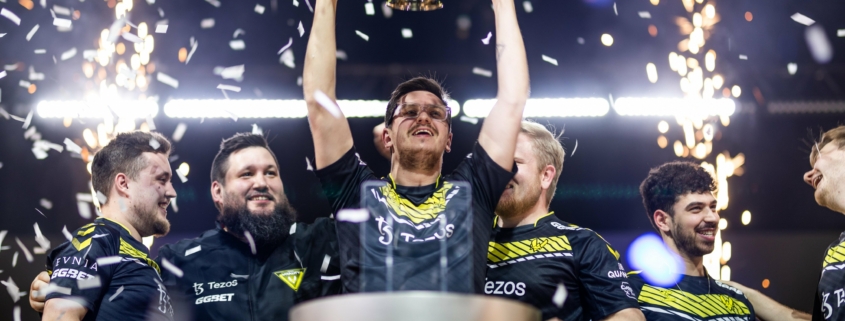 Team Vitality's Apex picking up the trophy of IEM Rio 2023